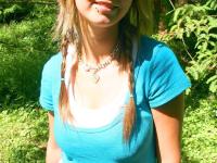 Cutie Britt Phillips in pigtails removing her top to sun her big titties - Photo #4