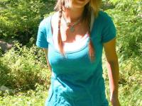 Cutie Britt Phillips in pigtails removing her top to sun her big titties - Photo #5