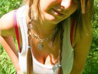 Cutie Britt Phillips in pigtails removing her top to sun her big titties - Photo #7