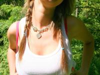 Cutie Britt Phillips in pigtails removing her top to sun her big titties - Photo #8