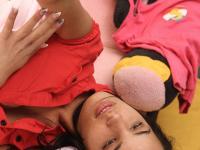 Brunette girl with natural tits Naomi G reveals her muff and fingers it - Photo #1