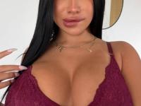 Solo girl with dark hair and tattoos frees her big butt from sensual lingerie - Photo #2