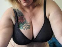 Older BBW Kris Ann takes self shots of her large tits during solo action - Photo #9