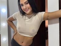 Brunette teen covers up her small tits while changing her underwear - Photo #16