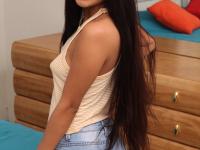 Long haired Latina girl Binky Baez fingers her pussy during her nude debut - Photo #2