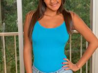 Latina girl Antonella Perez plays with her shaved pussy during solo action - Photo #1