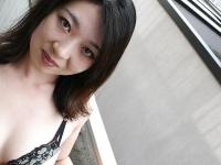 Asian MILF Naho Tajiri taking off her lingerie and toying her hairy gash - Photo #4