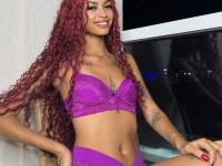 Tattooed redhead with long hair poses on a bed to entice big white cocks - Photo #3