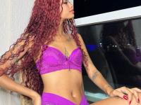 Tattooed redhead with long hair poses on a bed to entice big white cocks - Photo #4