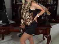 Hot granny Candis toying her cock-hungry wet pussy in solo office masturbation - Photo #1