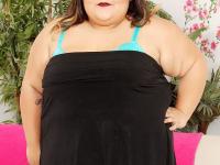 Hot Asian SSBBW Sugar strips sexy lingerie to show saggy tits & suck cock - Photo #1