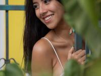 Pretty Latina with a leg tattoo Iris Lucky presents her big tits & masturbates - Photo #2