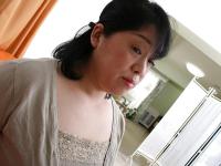 Brunette mature Eiko Imamiya undresses her skirt and shows her Asian ass - Photo #2