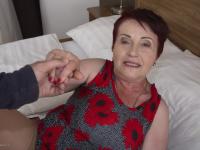 Redheaded granny has her big boobs fondled while being masturbated - Photo #9
