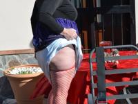 Blonde granny Melody displays her big ass while wearing a thong and fishnets - Photo #9