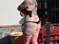 Blonde granny Melody displays her big ass while wearing a thong and fishnets - Photo #15