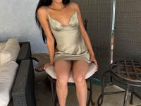 Brunette amateur Laynee James displays her bare feet prior to showing her pussy - Photo #1