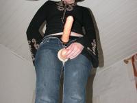 Femdom Helen Sykes strips naked while playing with her BDSM sex toy - Photo #11