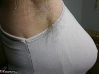 Horny granny Caro in high heels flaunting hairy armpits & mature ass - Photo #4