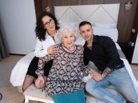Kinky granny takes part in a threesome with a younger couple - Photo #1