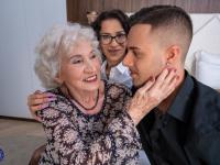 Kinky granny takes part in a threesome with a younger couple - Photo #3