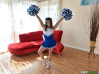 Foxy cheerleader Cassidy Klein pulling up her dress to unveil her bushy clam - Photo #2