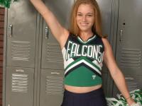 Teen cheerleader gets totally naked in front of change room lockers - Photo #1