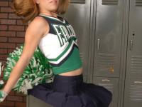 Teen cheerleader gets totally naked in front of change room lockers - Photo #2