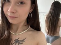 Brunette teen with tattoos Lola Sin teases with her ass in gray undies - Photo #10