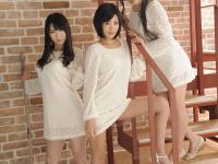 Three Japanese girls get naked in heels while posing together on steps - Photo #1