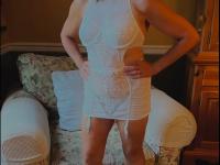 Sexy granny Lourdes Rodriguez shows off her juicy tits and her hot legs - Photo #1
