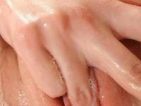 Blonde teen Yana C dips a finger in her wet bald pussy while showering - Photo #20