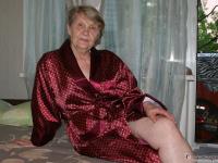 Naughty granny Belly shows off her big booty and spreads her hairy pussy - Photo #1