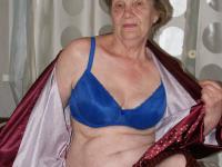 Naughty granny Belly shows off her big booty and spreads her hairy pussy - Photo #2
