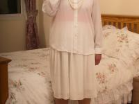 Slutty granny Rosemary toying her hungry old pussy in a red corset - Photo #2