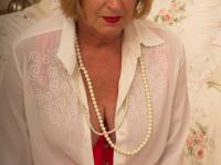 Slutty granny Rosemary toying her hungry old pussy in a red corset - Photo #7