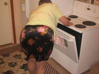 Old woman Girdle Goddess strips to pantyhose in her kitchen - Photo #2