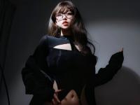 Sexy Asian secretary poses for a tempting non-nude solo shoot in glasses - Photo #1