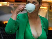 Mature lady with natural tits gets naked while being watched by men - Photo #7