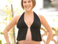 Pregnant lady Violet exposes her boobs and fondles her swollen vagina - Photo #2
