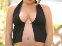 Pregnant lady Violet exposes her boobs and fondles her swollen vagina - Photo #8