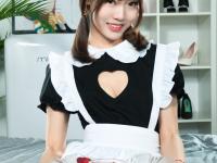 Adorable Asian maid licks whipped cream from her stocking covered feet - Photo #2