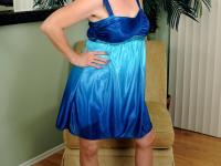 Mature blonde Sandi exposes her big tits and poses in stockings & sandals - Photo #1