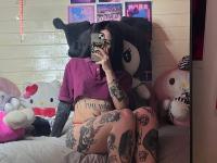 Brunette teen takes selfies while stripping to her thong on a bed - Photo #9