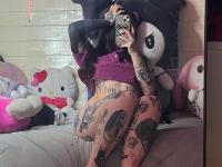 Brunette teen takes selfies while stripping to her thong on a bed - Photo #10