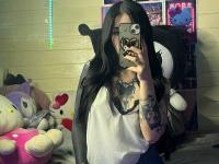 Brunette teen takes selfies while stripping to her thong on a bed - Photo #17