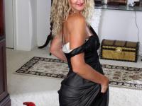 Fantastic MILF Zoe Marks slowly removes her black dress and rubs her clit - Photo #7