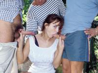 Slutty MILF Sandra Kay rubs her pussy before getting a raunchy DP in the park - Photo #6