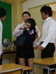 Japanese student Tomoyo Isumi receives facial cumshots in a classroom
