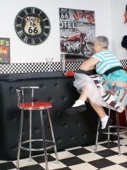 Old American lady Savana exposes her big butt in basement bar